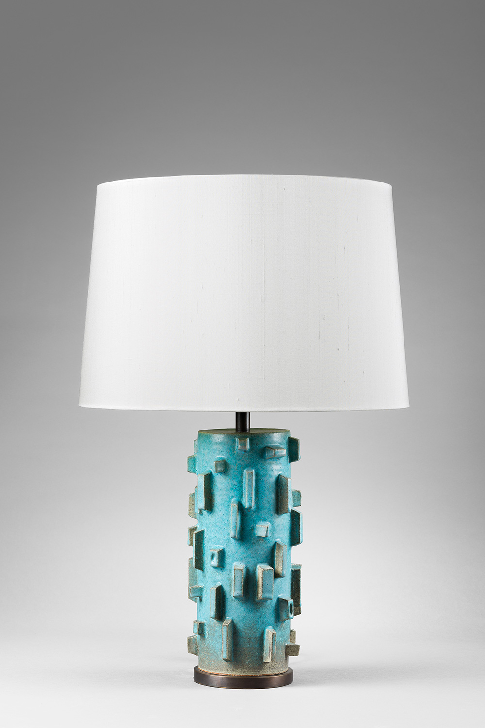 Small turquoise “Sandbar” lamp